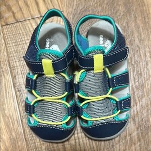 Stylish Kids Sandals with Yellow and Blue Accents see Kai run